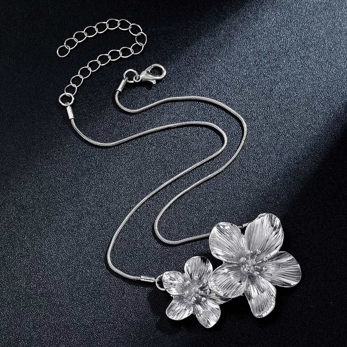 Europe and the United States cross-border fashion exaggerated creative heavy metal flower five petal flower women stud earrings suitable for holiday party accessories